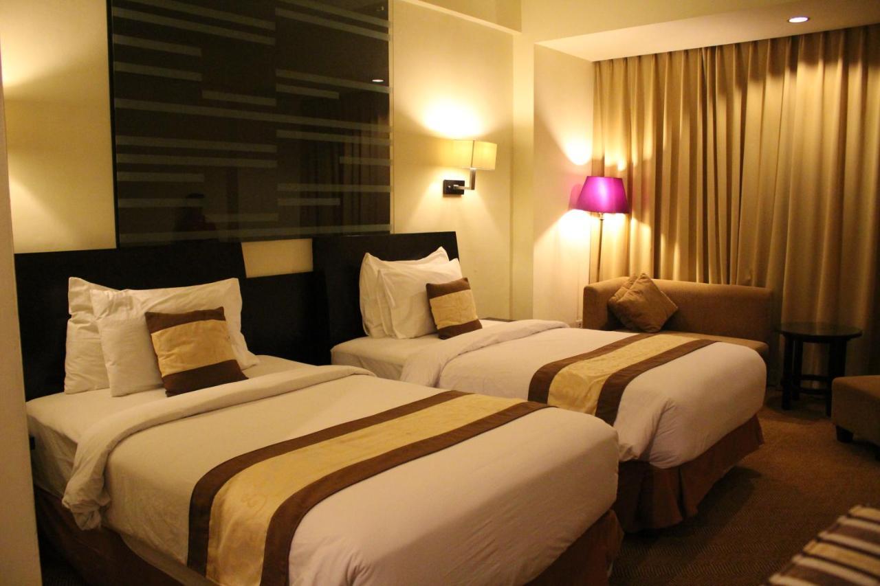 Swiss-Belhotel Silae Palu Exterior photo